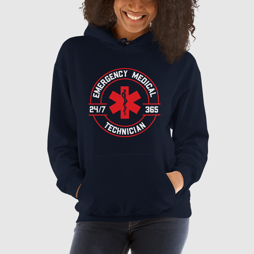 woman wearing navy blue hoodie with EMT 24/7 365 design on front